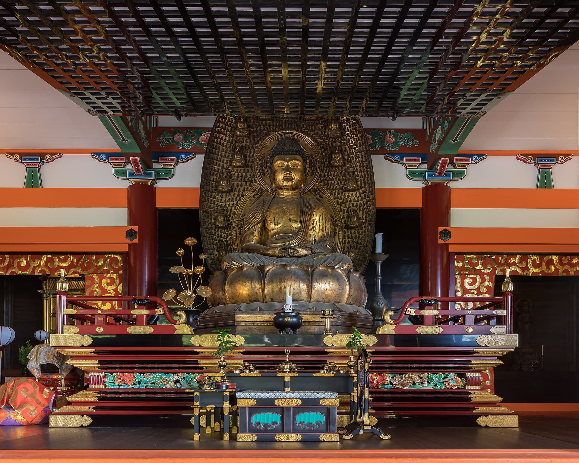Interior of a Pure Land Amida hall with a golden seated statue of Amitabha Buddha, Kyoto