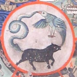 The hub of the Bhavacakra (Wheel of Life), showing the pig, snake, and bird representing delusion, hatred, and greed