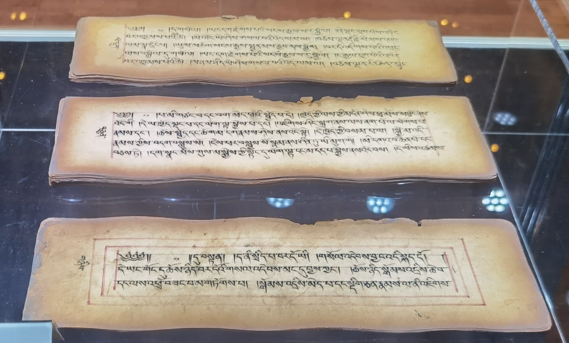 Tibetan manuscript pages of the Bardo Thödol on display