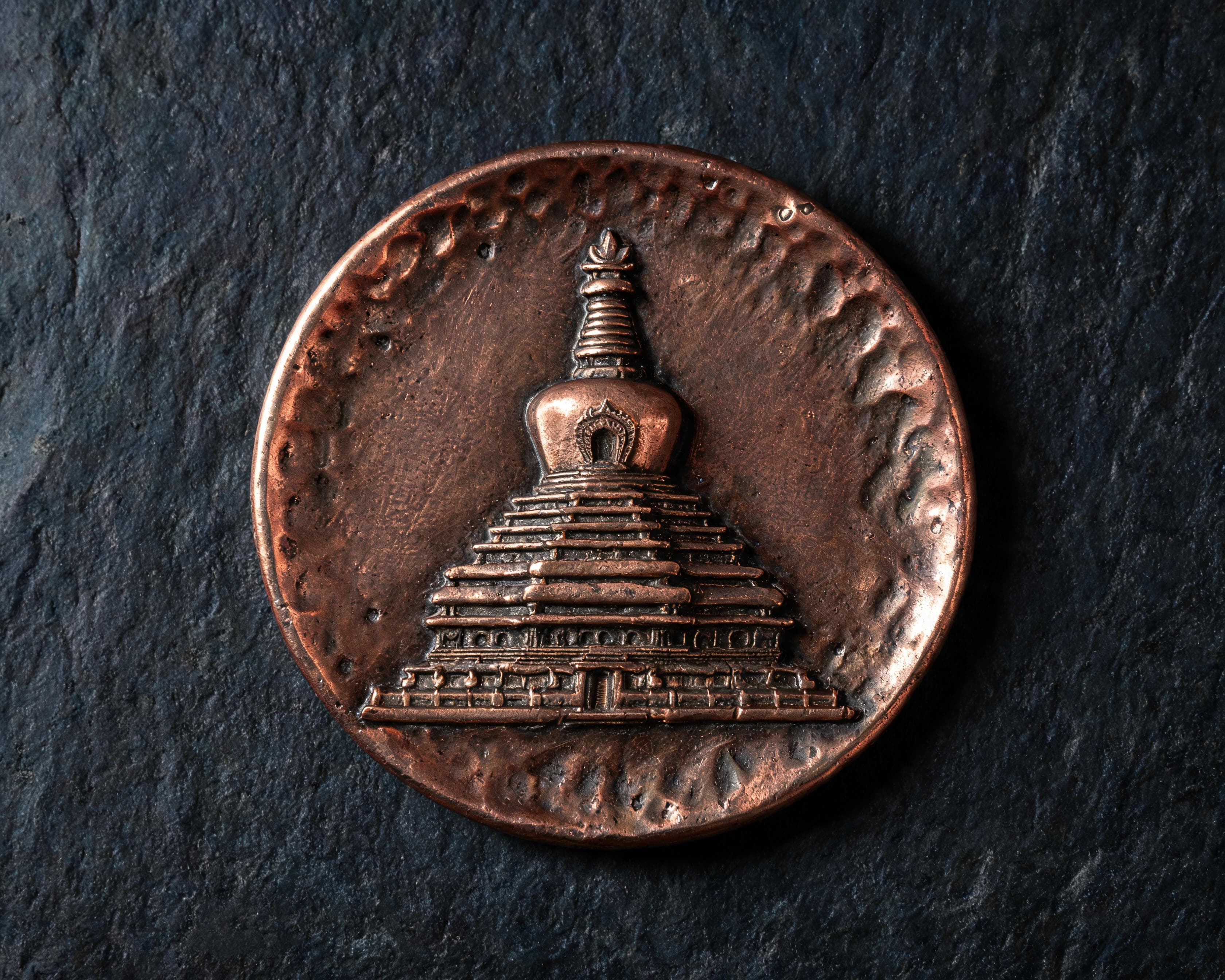 Bronze stupa medallion, cast relief